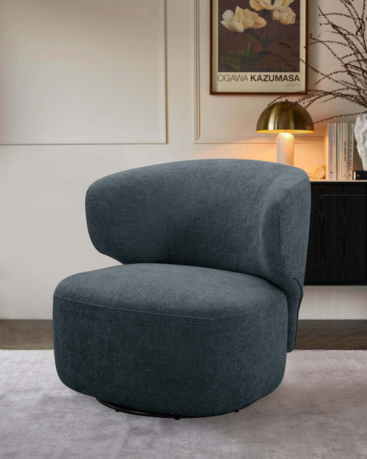 Stylish, curved green accent chair with plush upholstery, set against a minimalist backdrop featuring soft lighting and decor.