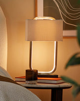 Sanza natural linen and brushed bronze table lamp