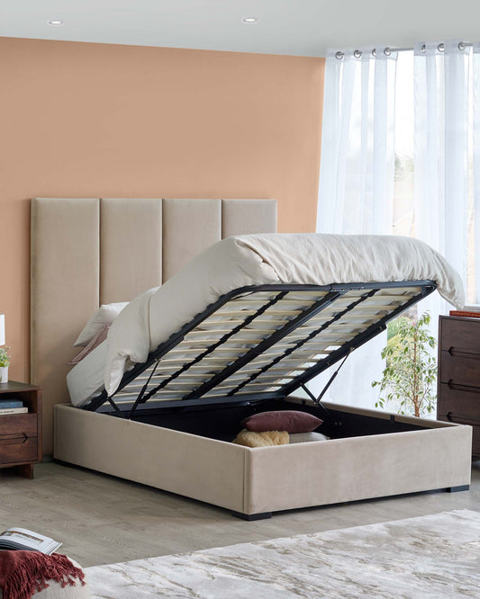 Modern upholstered bed with a spacious storage base, lifted mattress, paired with wooden nightstands and vibrant decor.