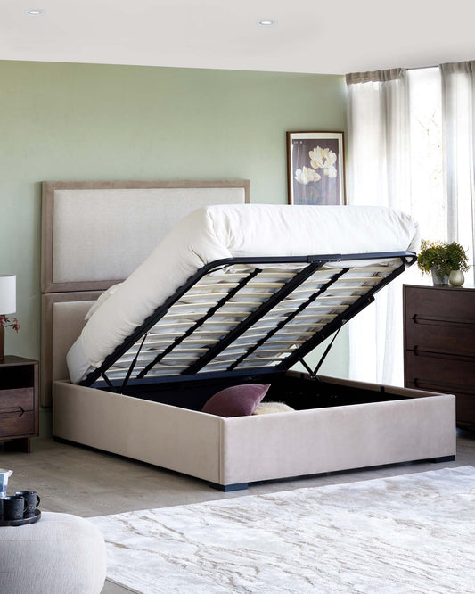 Contemporary bed with a plush headboard, storage lift feature, paired with a stylish nightstand and a soft area rug.