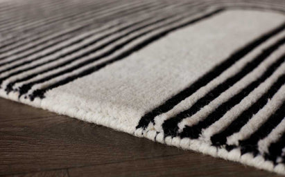 Abstract Lines Medium Sculpted Wool Rug Black and Cream