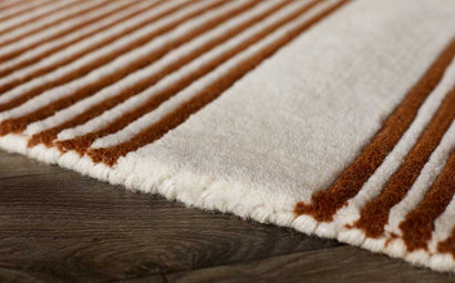 Abstract Lines Medium Sculpted Wool Rug Rust and Cream