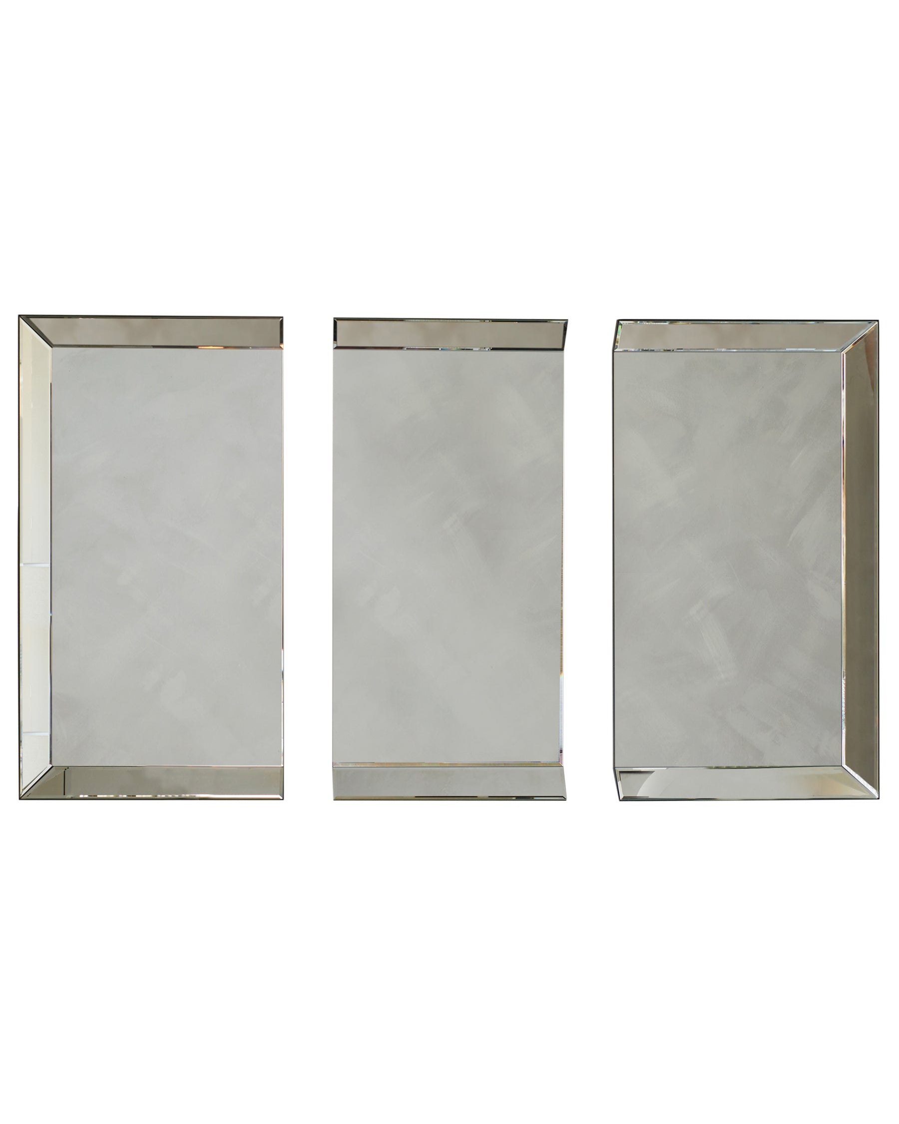 Three rectangular mirrored panels with sleek edges, displaying a minimalist and modern design.