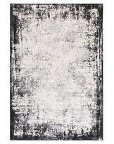 Modern abstract-design area rug featuring a gradient of grey tones with weathered black border detailing, suitable for contemporary interior decor.