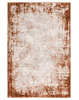 A vintage-style area rug with a distressed design featuring a gradient of brown to beige colours.