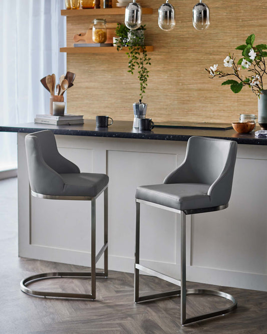 Stylish gray barstools with sleek metal frames, perfect for a contemporary kitchen or dining area.