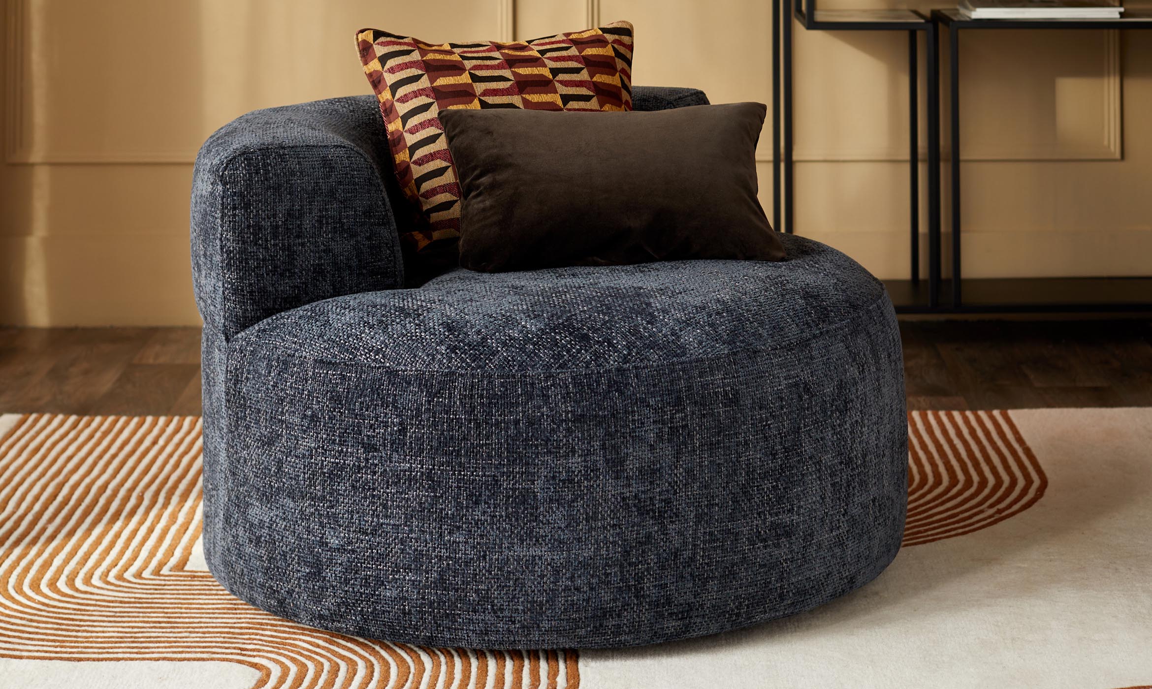 Gianna dark blue weave swivel armchair