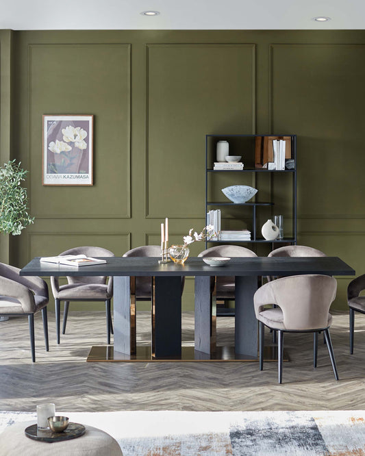 Elegant dining table with a dark finish, surrounded by plush gray chairs, paired with a black shelving unit and decorative accents.