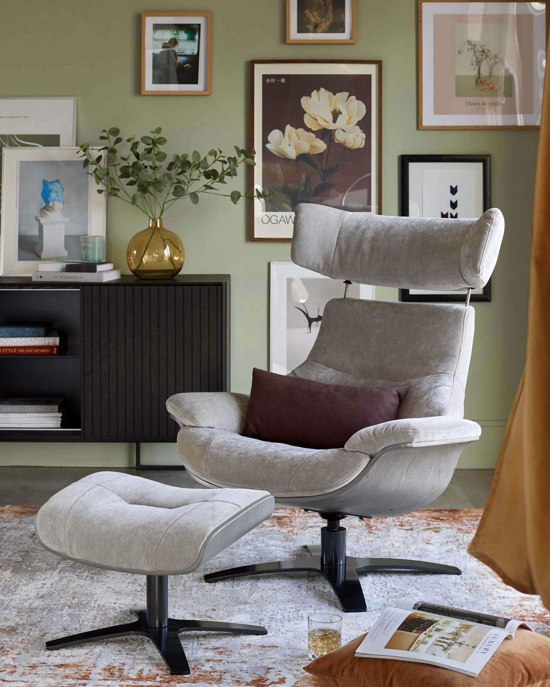 Modern velvet upholstered swivel armchair with a high backrest and matching ottoman, both featuring a sleek black star-shaped base. A dark wooden mid-century modern-style cabinet with vertical slats and black metal handles in the background adds a classy storage solution.