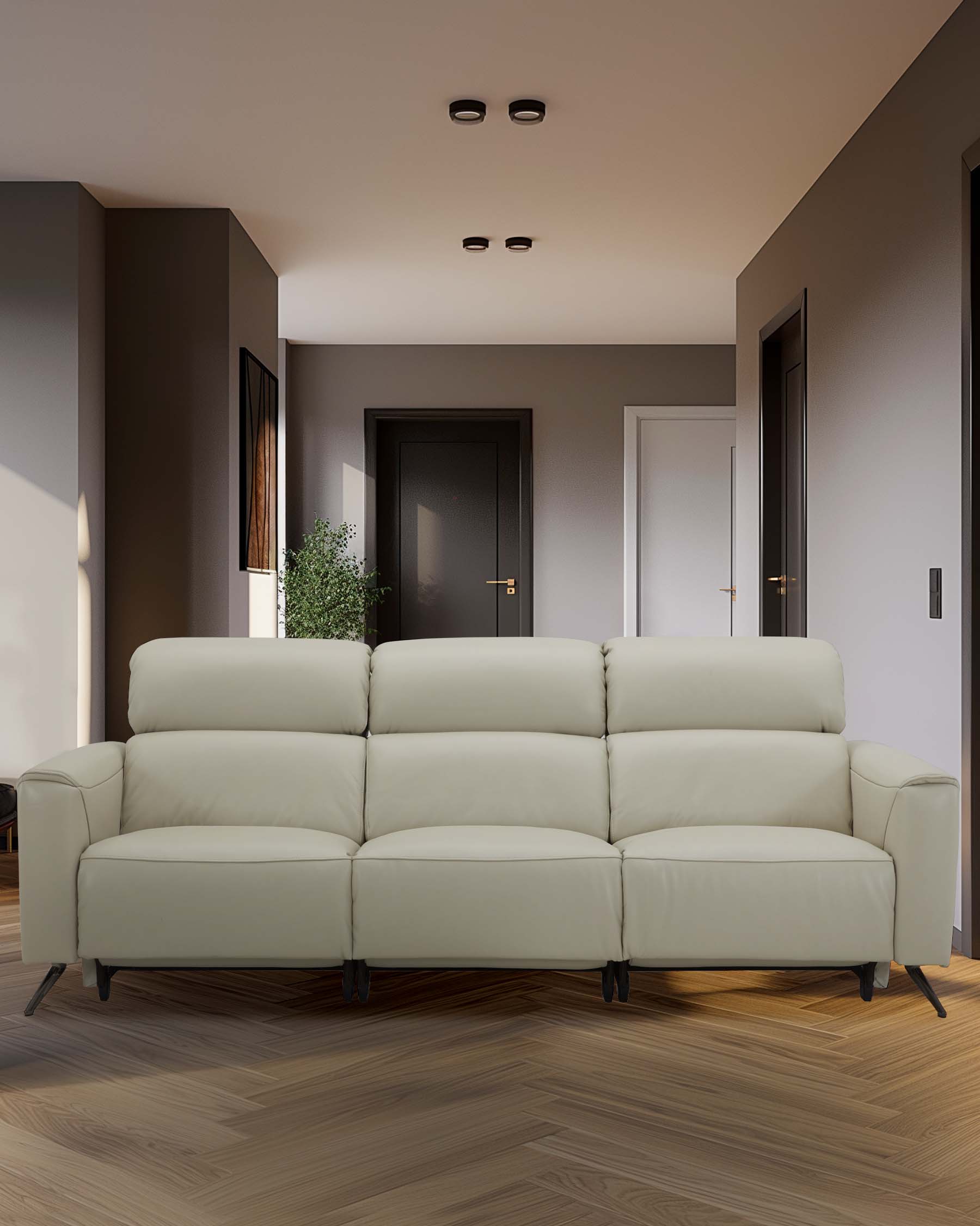 A modern, light beige reclining sofa with sleek lines and minimalist design, set against a stylish, contemporary interior.