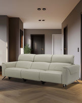 A modern light beige sofa with padded backrests and sleek black legs, set against a stylish interior backdrop.