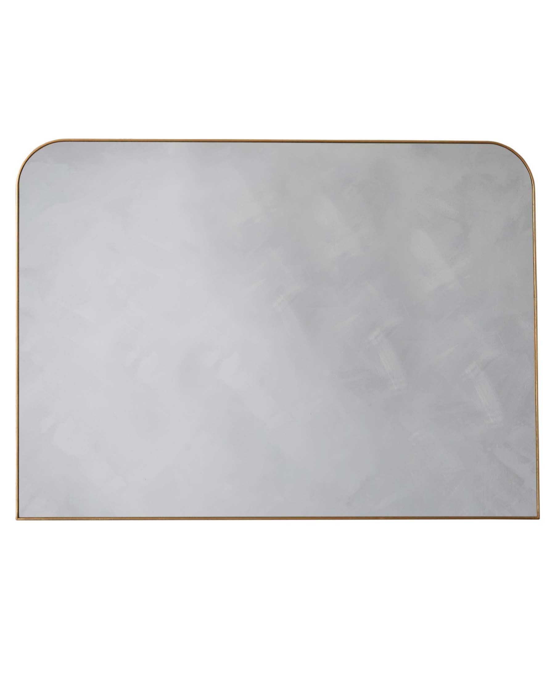 Elegant rectangular wall mirror with softly rounded corners and a thin, minimalist golden frame.