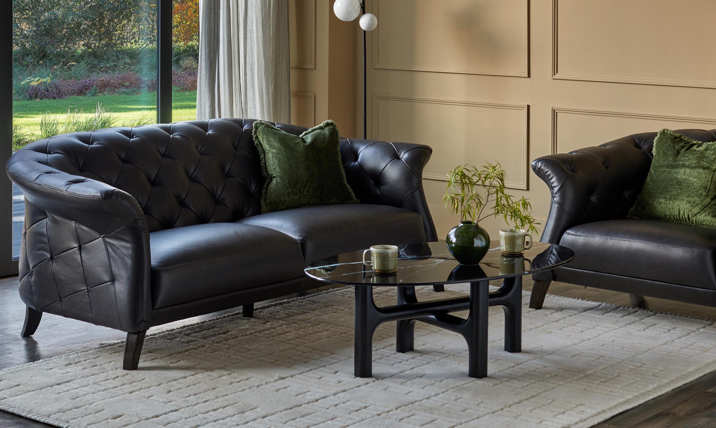 Luxe black leather 2 seater sofa