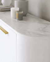 Elegant white curved console table with a faux marble top and gold-coloured handle accents.