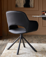 Marlow black faux leather swivel dining chair (Sold in pairs)