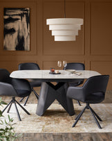 Marlow black faux leather swivel dining chair (Sold in pairs)