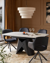 Marlow black faux leather swivel dining chair (Sold in pairs)