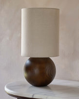 Orlan natural linen and dark wood table lamp