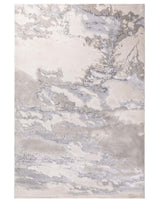 Elegant area rug featuring an abstract marble-like pattern in shades of grey and white, suitable for modern home decor.