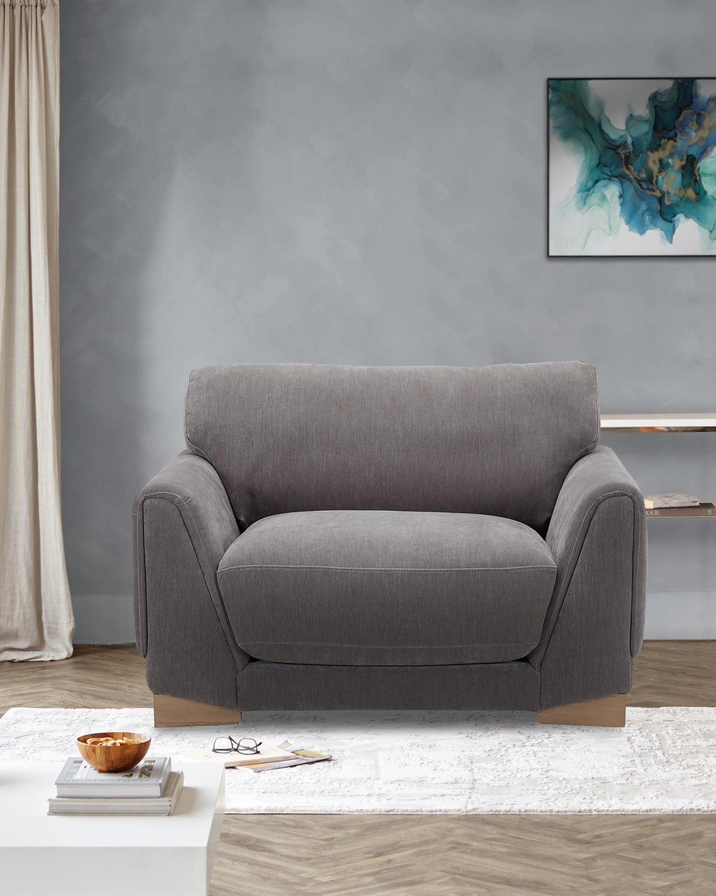 Saige mid grey fabric armchair with natural wood legs