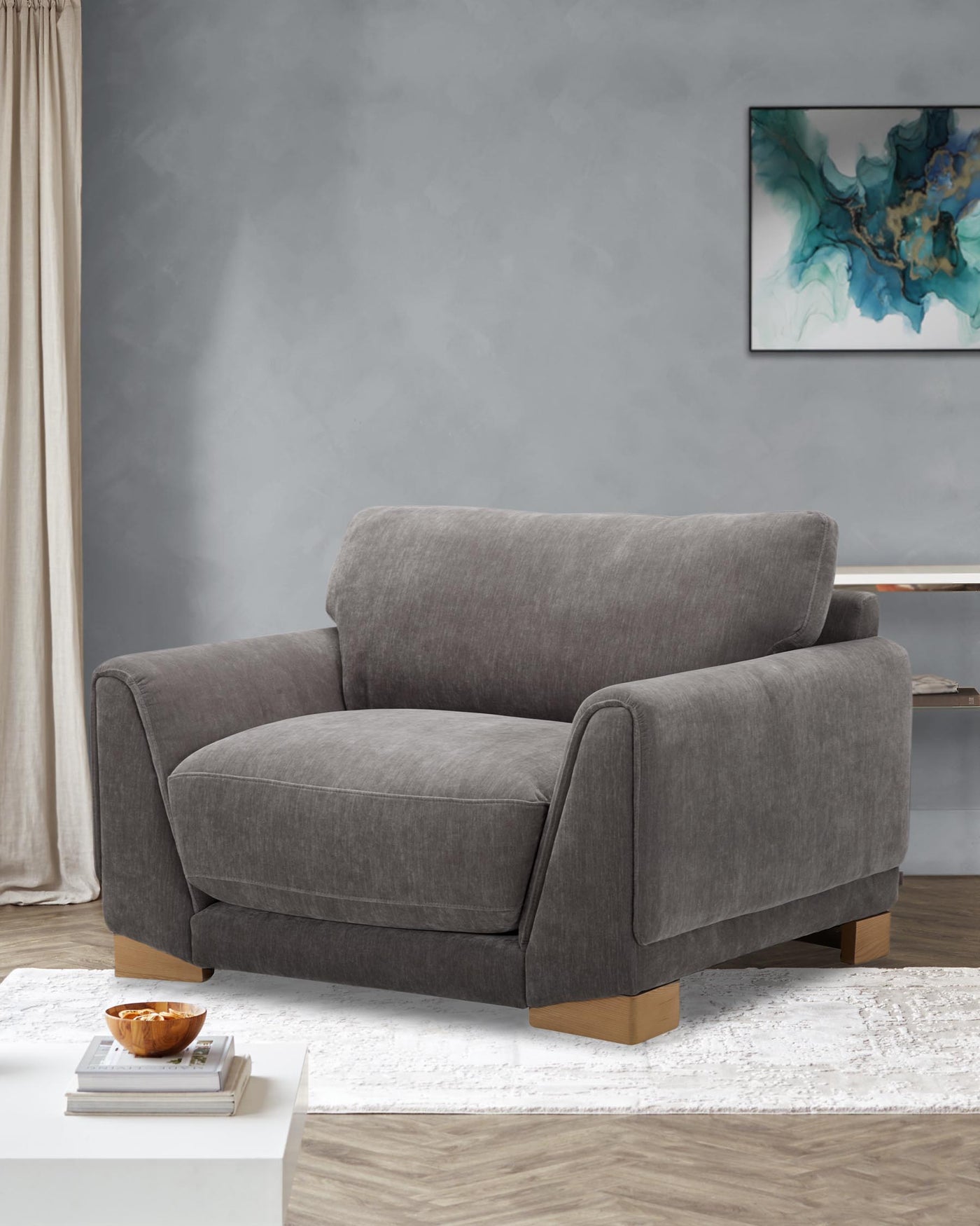 Saige mid grey fabric armchair with natural wood legs
