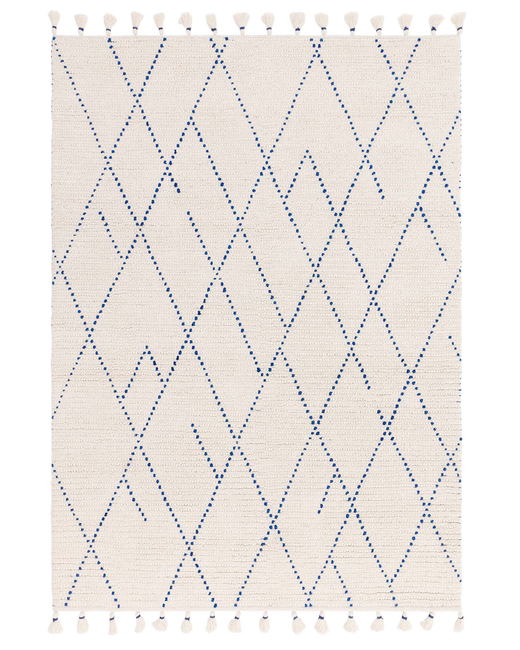 Woven area rug with a cream base and geometric diamond pattern in blue, featuring fringe tassels on the top and bottom edges.