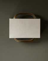 Sanza natural linen and brushed bronze wall light