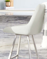 Modern white upholstered bar stool with sleek metal legs, perfect for contemporary kitchen or dining areas.