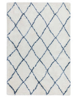 Plush white area rug with a diamond pattern in navy blue.