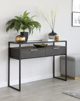 Modern minimalist console table with a dark wood finish and sleek black metal frame, featuring two drawers for storage.