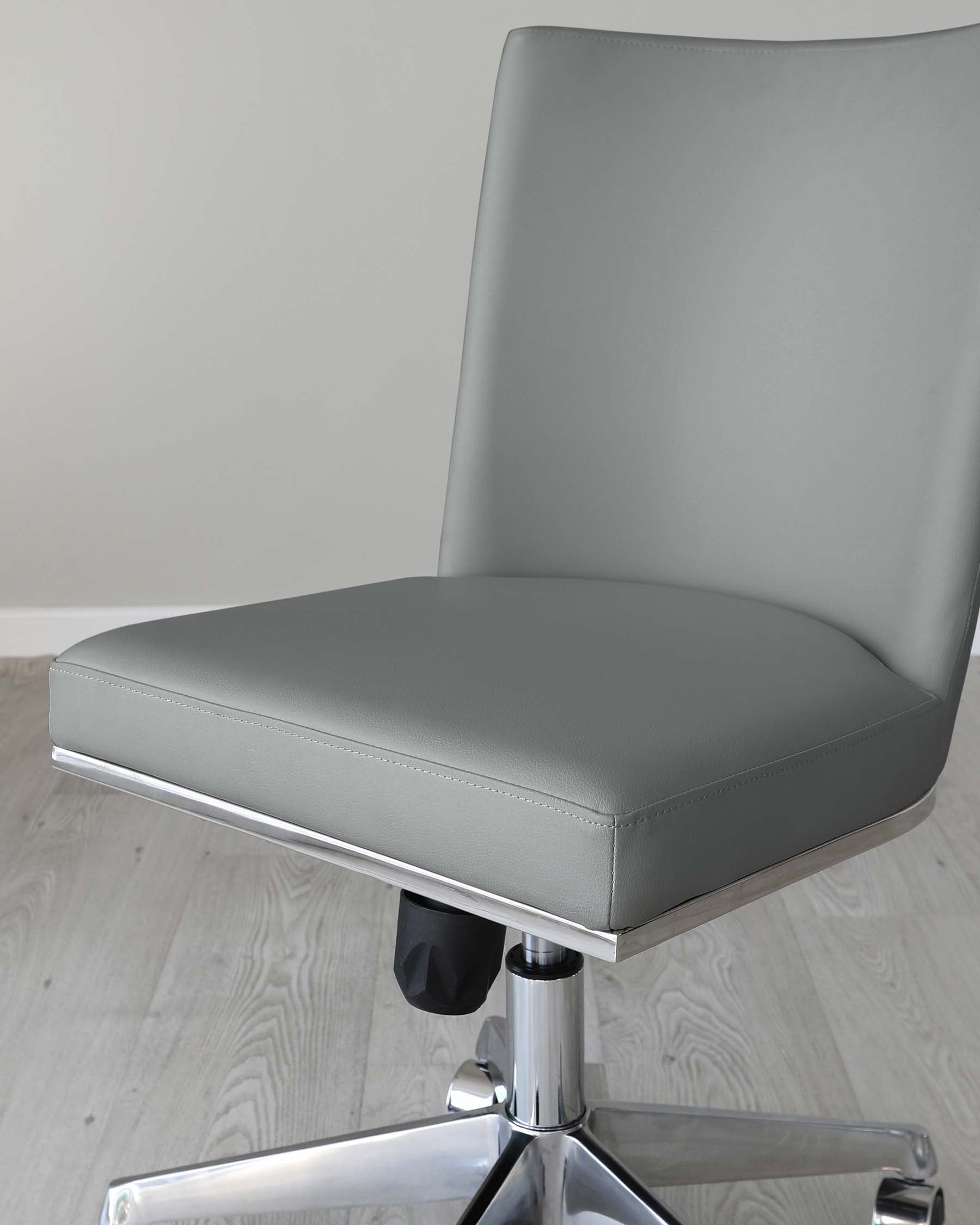 Modern grey office chair with a high back, padded seat, and chrome swivel base with five casters.