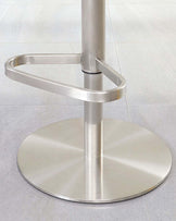 Polished stainless steel circular base of a bar stool with a centred supporting column and an attached footrest ring.