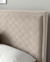 Elegant upholstered headboard featuring a scalloped top edge with tufted details forming a plush, timeless scallop pattern, in a neutral beige fabric.