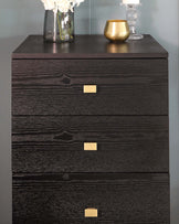 Modern dark wood textured dresser with rectangular gold-toned handles.