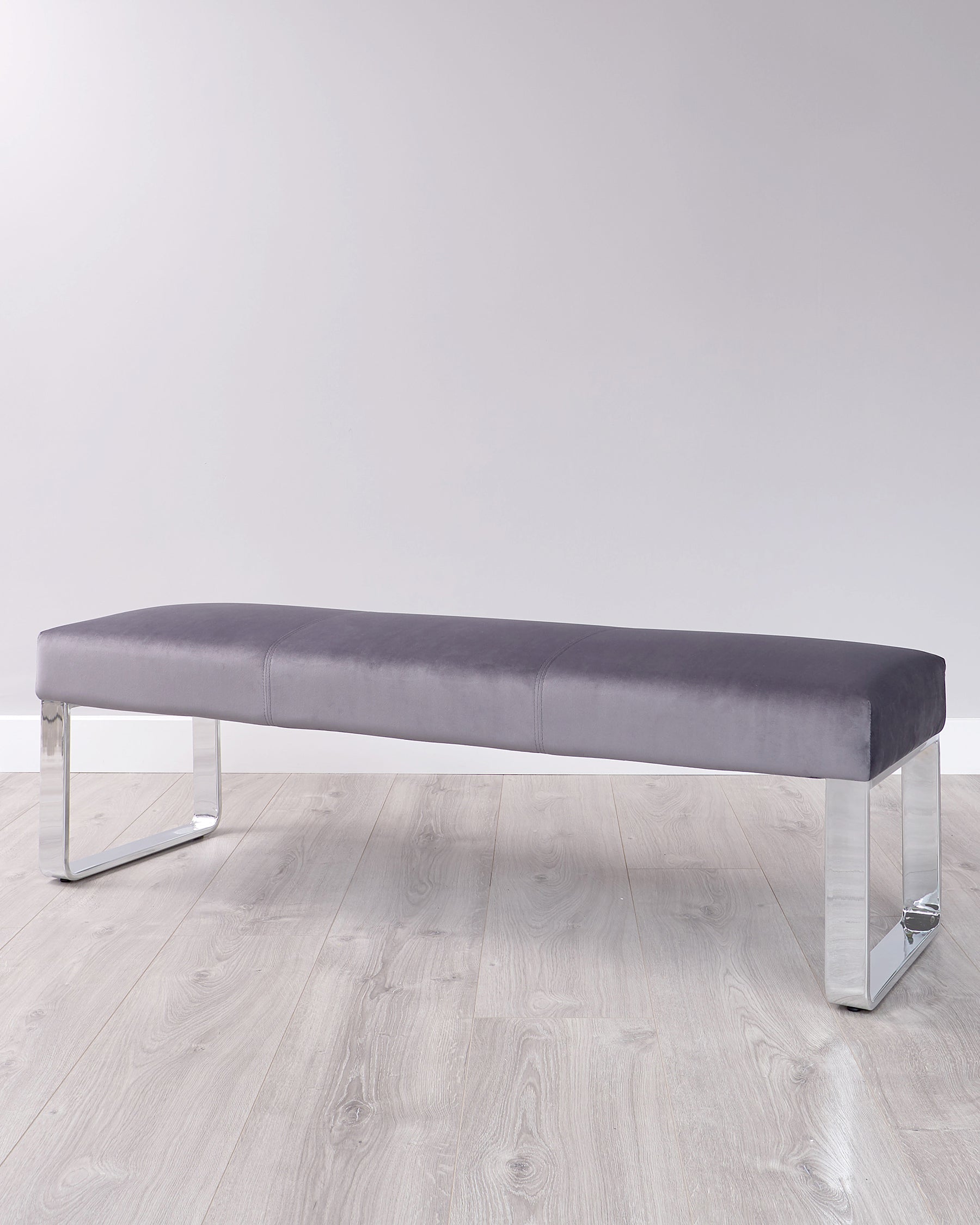 Sleek grey velvet bench with modern transparent acrylic legs, perfect for adding a stylish touch to any space.