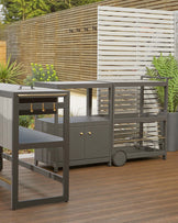 Contemporary outdoor furniture in sleek gray, featuring a side table with hooks, a storage unit, and an open shelf cart.